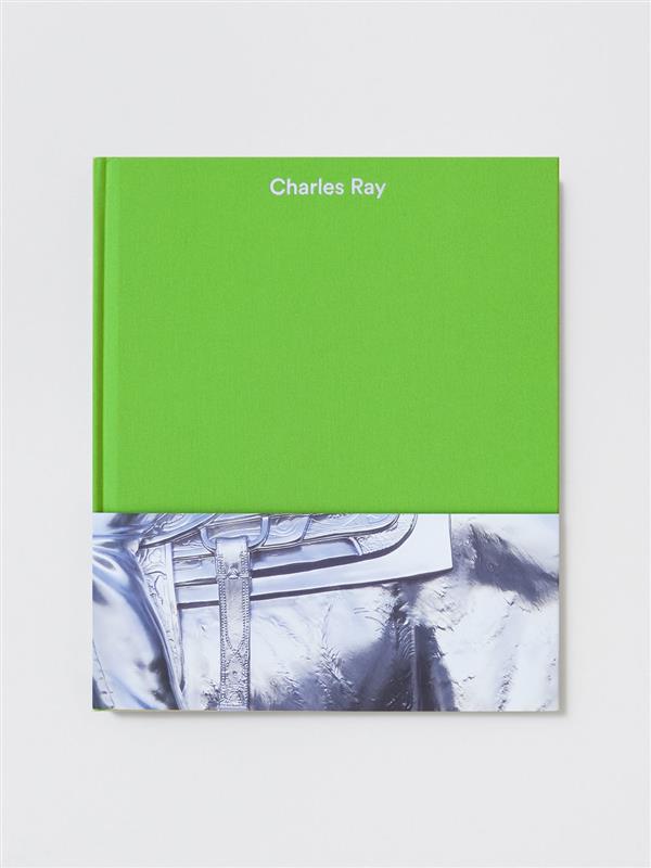 A gren book on a white background.